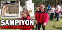 ŞAMPİYON KABRİ BAŞINDA ANILDI